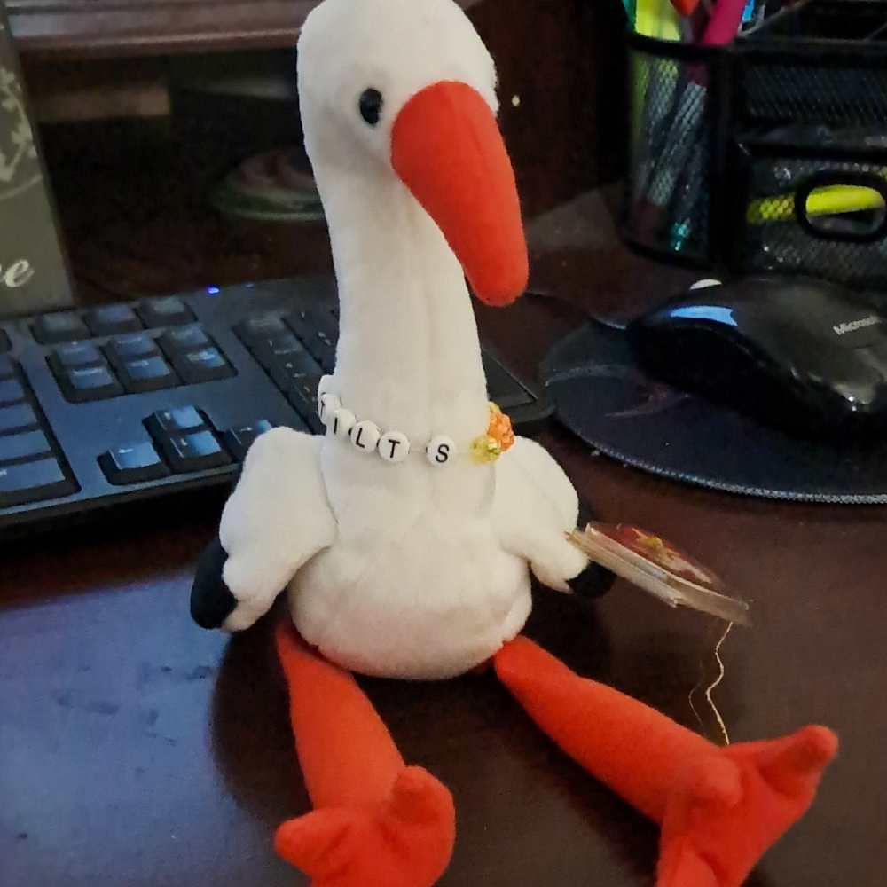 Plush Bird Toy with Red Accents